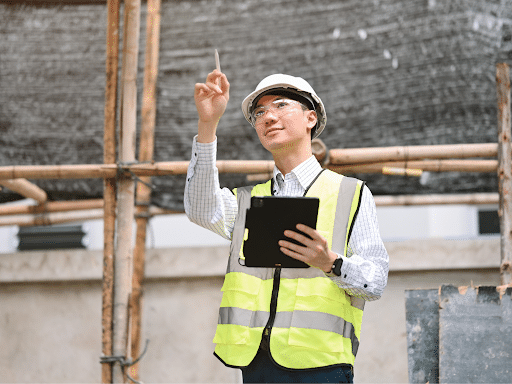 Man observing building